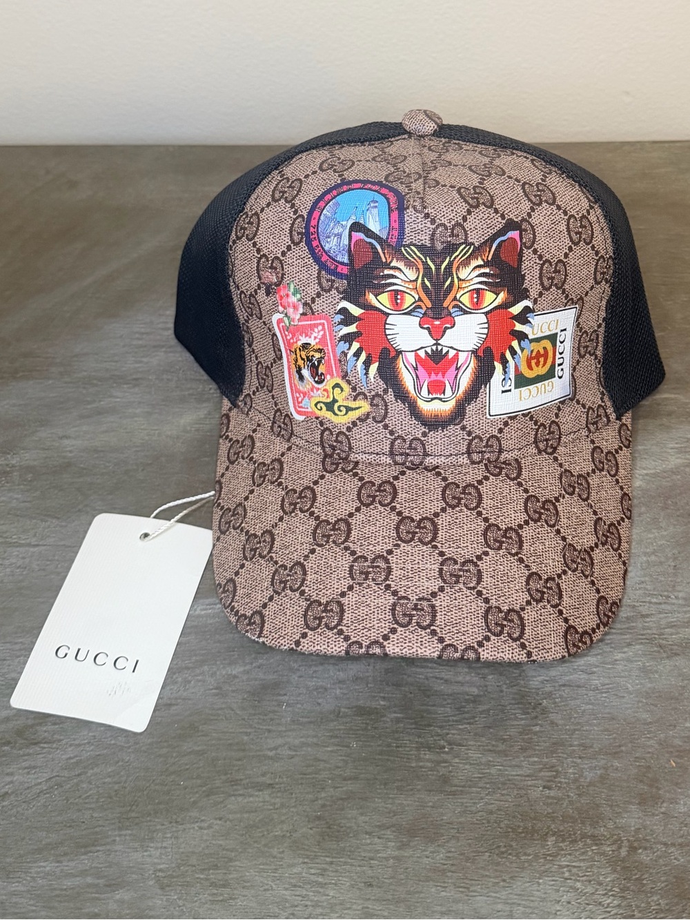 Gucci GG Supreme Angry Cat Trucker Hat